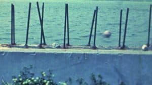 Rocks tossed into the river cause a musical sound when they hit the rebar.