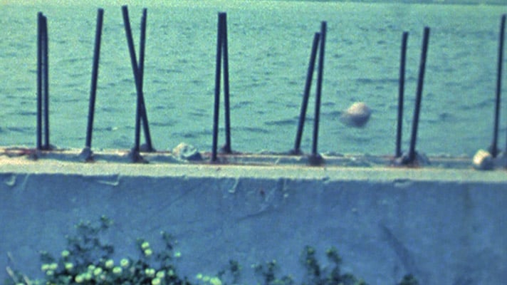 Rocks tossed into the river cause a musical sound when they hit the rebar.