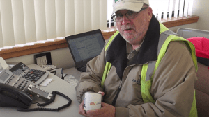 We see how thousands of cans of contaminated product are destroyed and recycled.